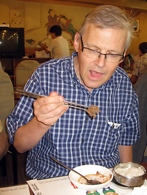 Hans practising Korean eating equipment